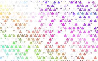 Light Multicolor, Rainbow vector seamless background with triangles.