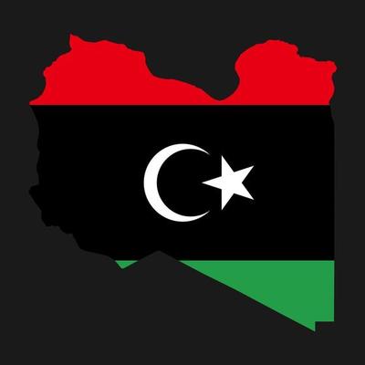 Libya map silhouette with flag on black background