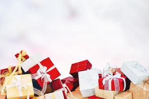 Gifts with ribbon bow on beautiful background photo