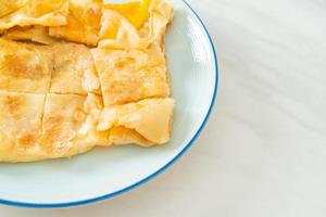 Roti with egg and sweetened condensed milk