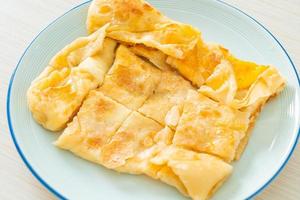 Roti with egg and sweetened condensed milk photo