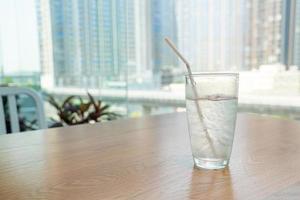 Water glass with ice photo