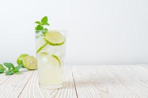 Iced lime soda with mint photo
