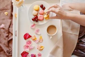 Top view of romantic breakfast in bed photo