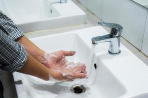 Cleaning Hands. Washing hands with soap photo