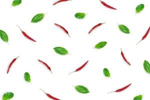 Raw material with basil leaves, chili on white background. photo