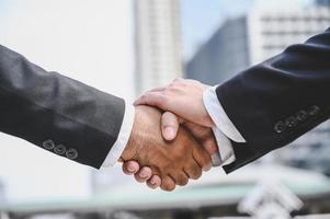 Business people shake hands To make a business photo