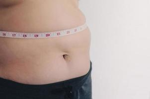 cuerpo humano y grasa corporal, panza o vientre y sobrepeso de personas. foto