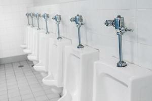 Public toilet and Bathroom interior with wash basin and toilet room. photo