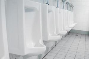 Public toilet and Bathroom interior with wash basin and toilet room. photo