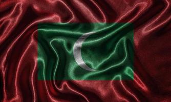 Wallpaper by Maldives flag and waving flag by fabric. photo
