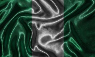 Wallpaper by Nigeria flag and waving flag by fabric. photo