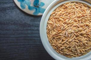 Background and wallpaper by pile of paddy rice and rice seed. photo