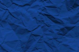 Deep Blue and vintage background by crumpled paper texture.