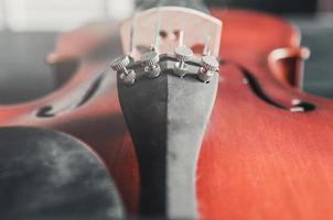 The violin on table, Classic musical instrument used in the orchestra. photo