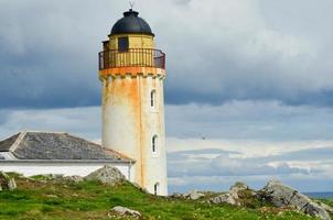 Lighthouse in the Isle of May, Scotland photo