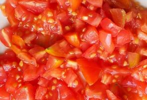 Chopped tomato for pizza photo