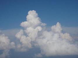 Blue sky with clouds background photo