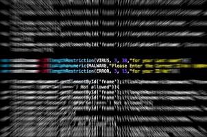 Screen of source code and abstract technology background photo