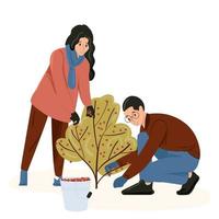 Young people man and woman pick berries from the bush vector