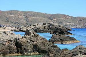 Blue lagoon kedrodasos beach crete island red sand waters background photo