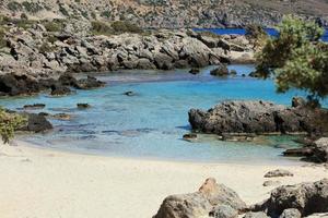 Blue lagoon kedrodasos beach crete island red sand waters background photo