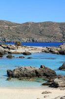 Blue lagoon kedrodasos beach crete island red sand waters background photo