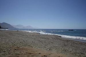 Rodakino beach crete island peristeres area summer background covid-19 photo