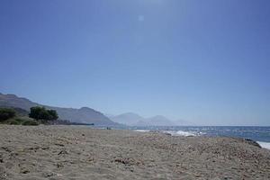 Rodakino beach crete island peristeres area summer background covid-19 photo