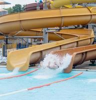 Man on a water slide photo