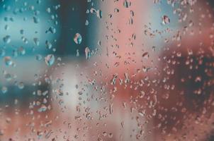 Background and wallpaper by rainy drop and water drops on window. photo