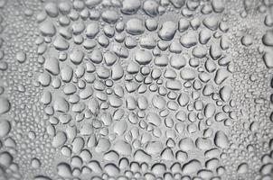 Background and wallpaper by rainy drop and water drops on window. photo