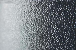 Background and wallpaper by rainy drop and water drops on window. photo