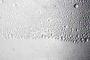 Background and wallpaper by rainy drop and water drops on window. photo