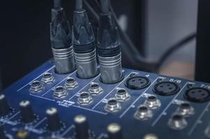 Audio mixer console and sound mixing with buttons and sliders. photo