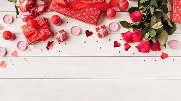 Red roses and Valentine's Day decorations, top view photo