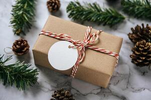 Gift boxes with small gifts on white cement photo