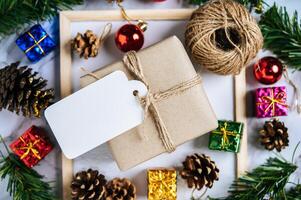 Gift boxes with small gifts on white cement photo