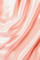 Abstract rose gold satin silky cloth for background photo