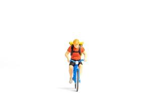 Miniature people Bicycle courier with parcel box on the back photo