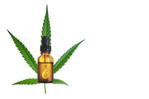 Marijuana leaf and hemp oil pictures dark background, photo