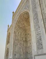 Taj Mahal Agra India Mogul marble mauso detailed architecture. photo