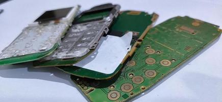 The damaged circuit board pile cellular is an older model photo