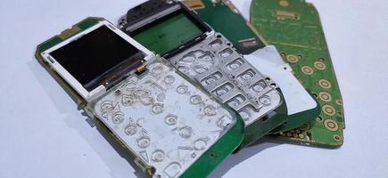 The damaged circuit board pile cellular is an older model photo