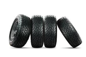 Set of 4 wheels car tires designed for use in all road conditions. photo