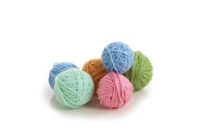 Color yarn ball on white background photo