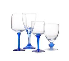 Modern wine glass on white background photo