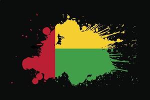 bandera de guinea bissau con diseño de efecto grunge vector