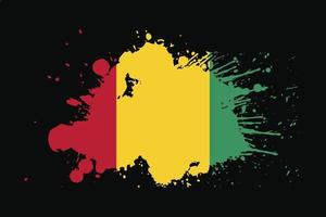 bandera de guinea con diseño de efecto grunge vector