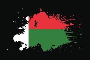 bandera de madagascar con diseño de efecto grunge vector